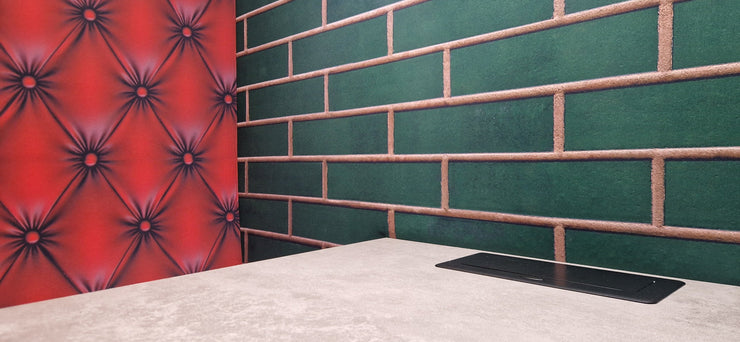 Detail of a Dapapod custom printed interior with green brick tile and red Chesterfield designs